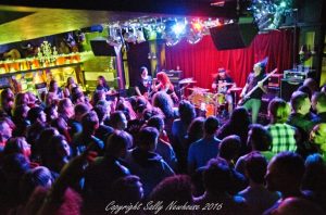 The crowd, the stage, and the hair. Wow, I love this place!